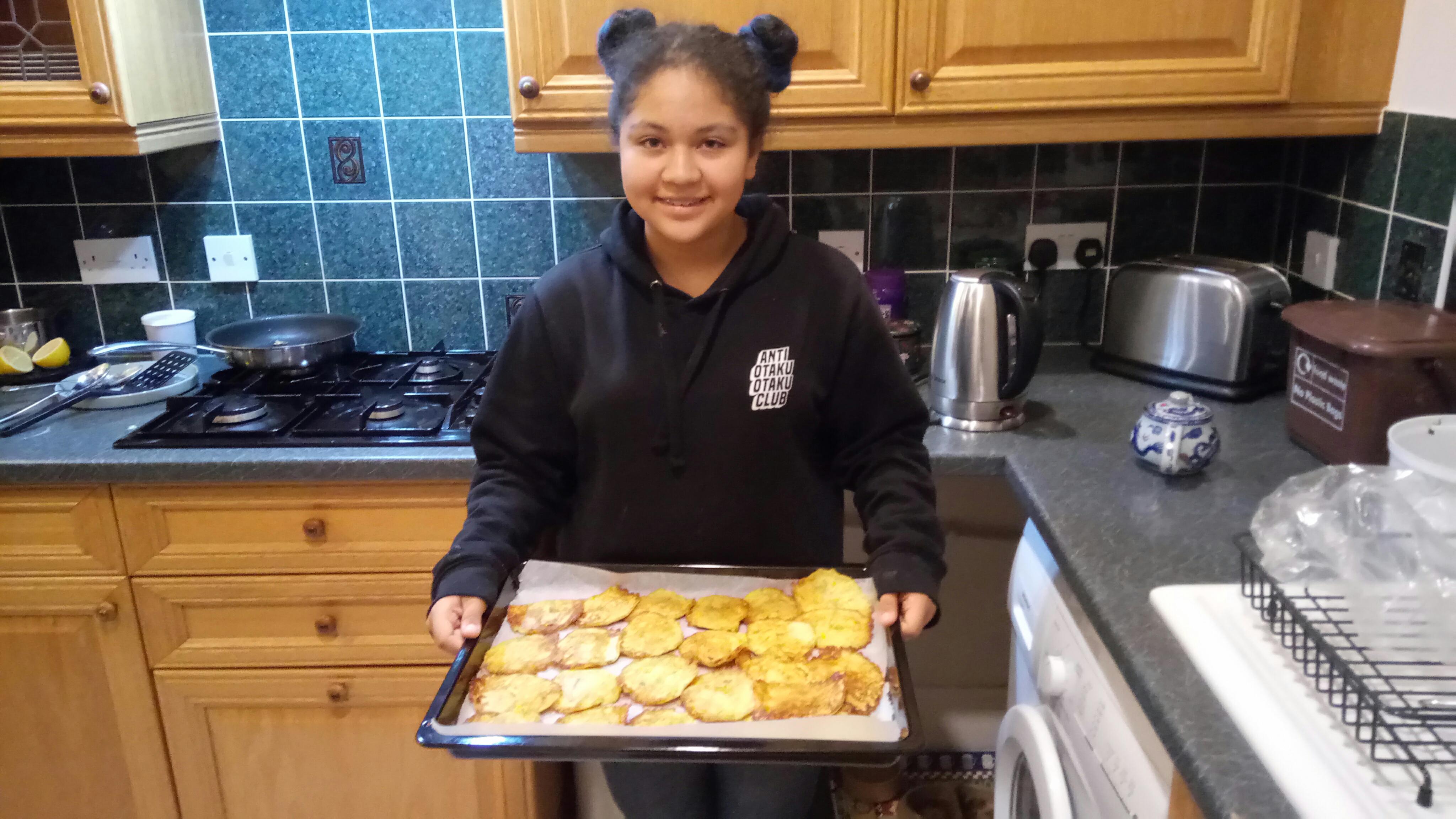 Nuria holding sweetcorn fritters