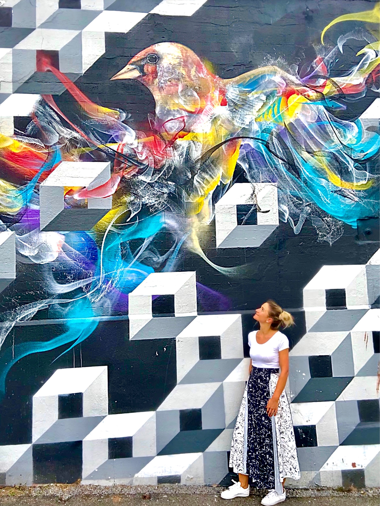 Student Roxana with colourful graffiti