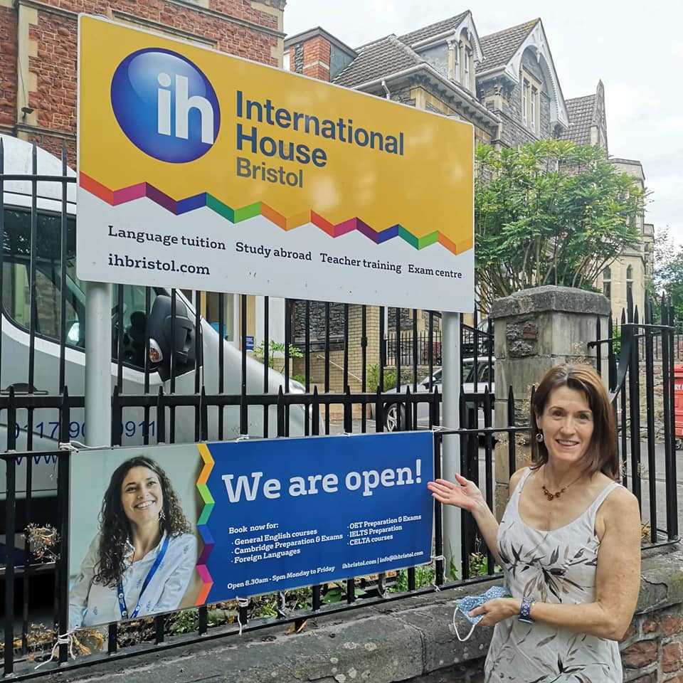 IH Bristol Director Val in front of IH Bristol Queens Avenue 