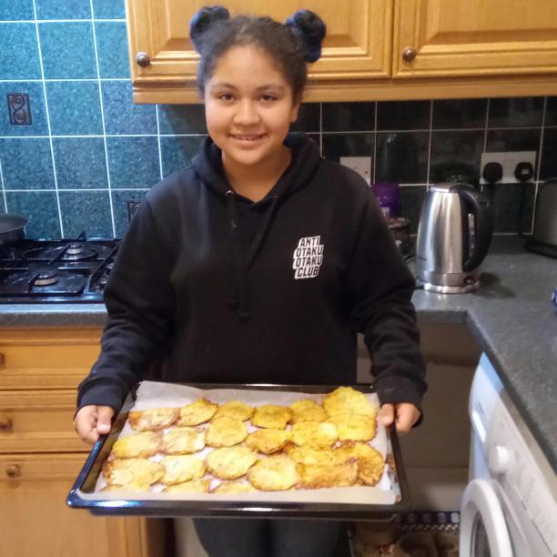 Nuria holding sweetcorn fritters
